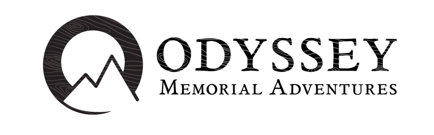 the logo for Odyssey Memorial Adventures, featuring an abstraction of a sun setting behind a mountain.